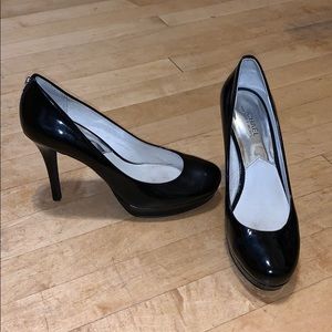 Black patent leather Michael Kors pumps